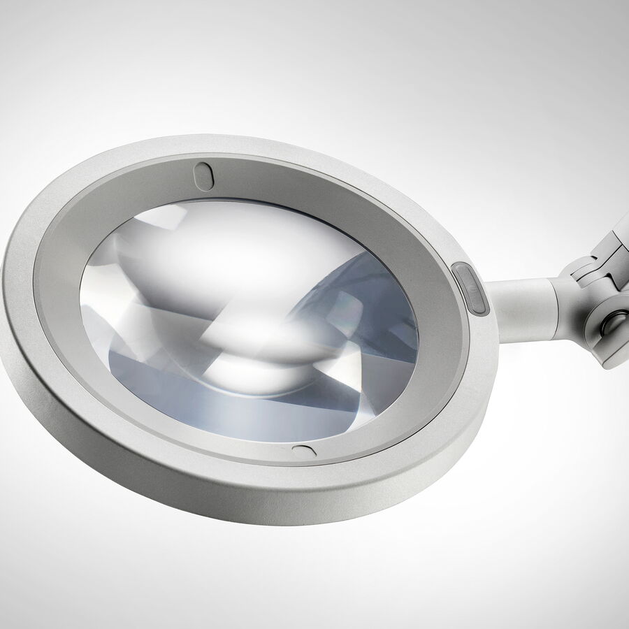 OPTICLUX Untersuchungsleuchte mit integrierter Lupe für präzise medizinische Untersuchungen